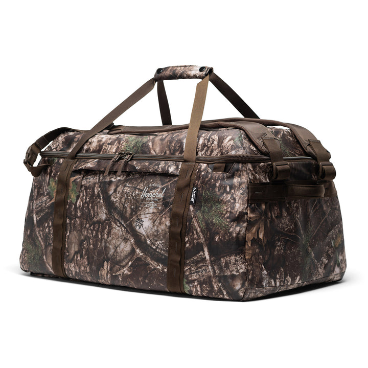 Herschel Supply Co. All Season 66 L Duffel Realtree APX™ Camo