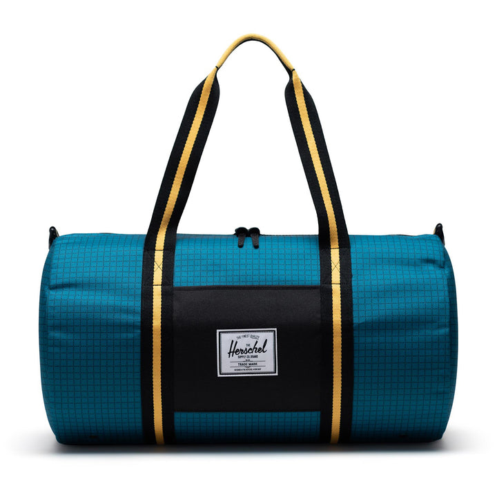 Herschel Supply Co. Sutton Mid-Volume Duffel Harbour Blue Grid/Black/Amber