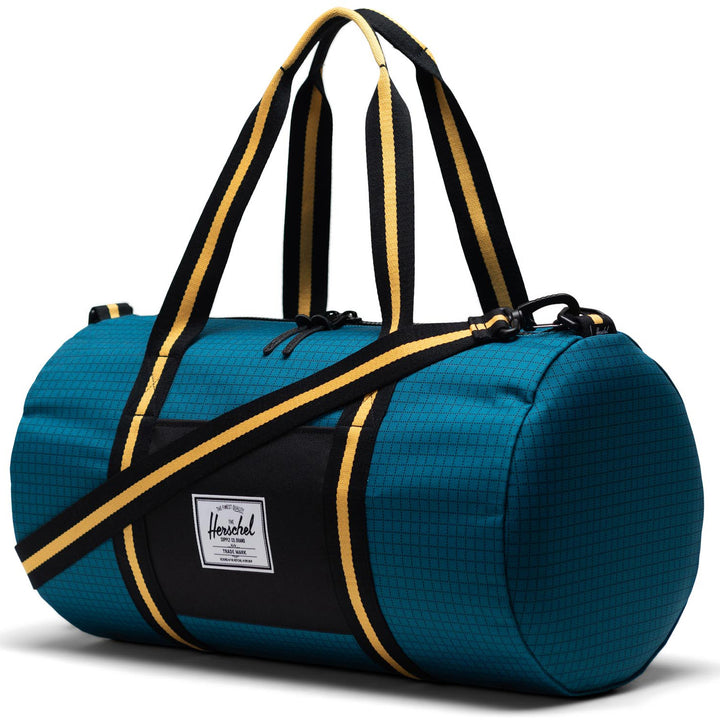 Herschel Supply Co. Sutton Mid-Volume Duffel Harbour Blue Grid/Black/Amber